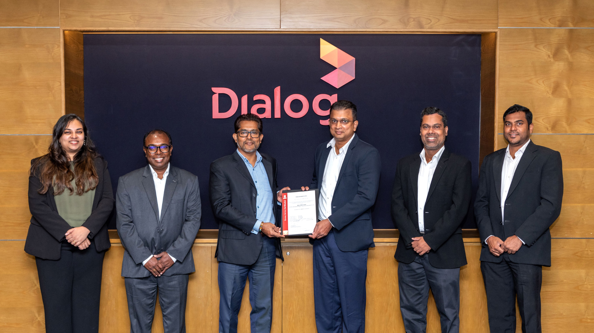 A group of people receiving certification