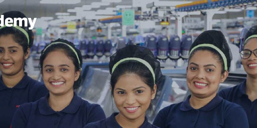 5 women standing and smiling