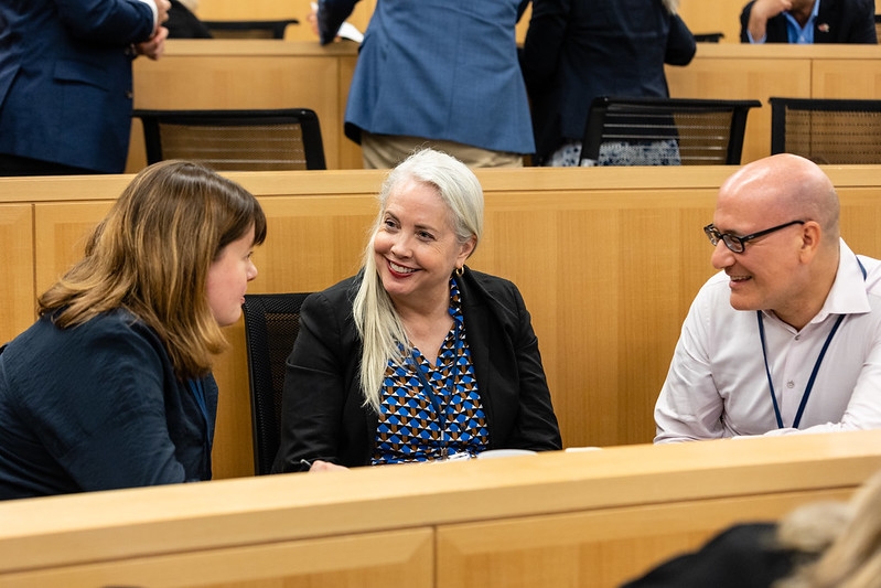 Individuals in disucssion during a convening