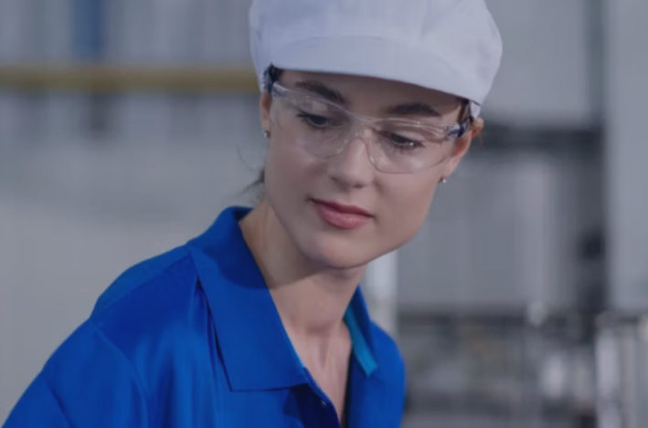 female worker with hat on