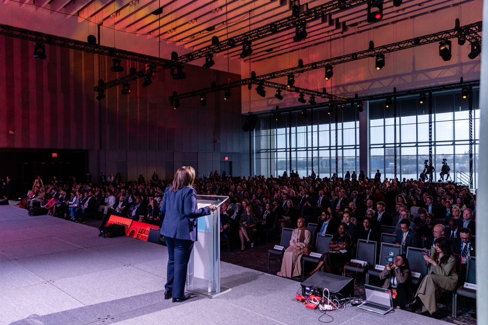 Sanda Ojiambo speaking to a crowd during UNGA79