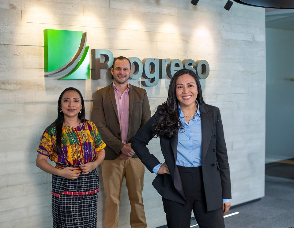 Group of three persons in the lobby 