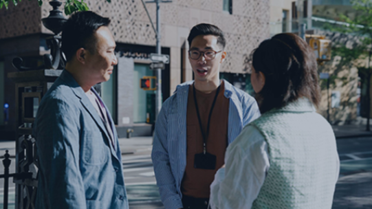 three people in a conversation