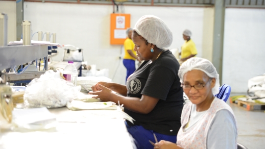 two women working in factory