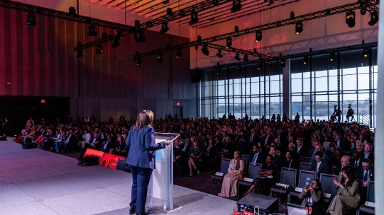 Sanda Ojiambo speaking to a crowd during UNGA79