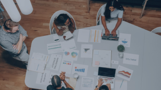 a team collaborating at a table
