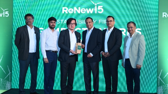 A group of people receiving award